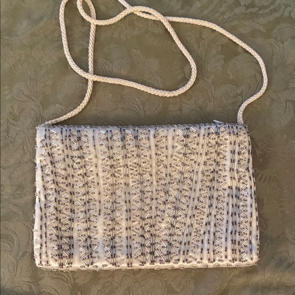 The Unbranded Brand Handbags - Elegant White and Gray Woven Clutch